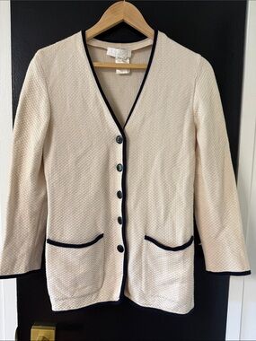 Escada cardigan cream-colored textured knit with contrasting blue trim.